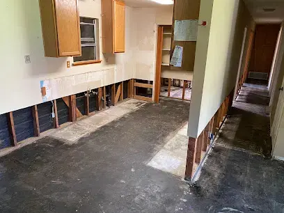 Flood cut along the lower drywall of a Lake Elsinore kitchen and hallway
